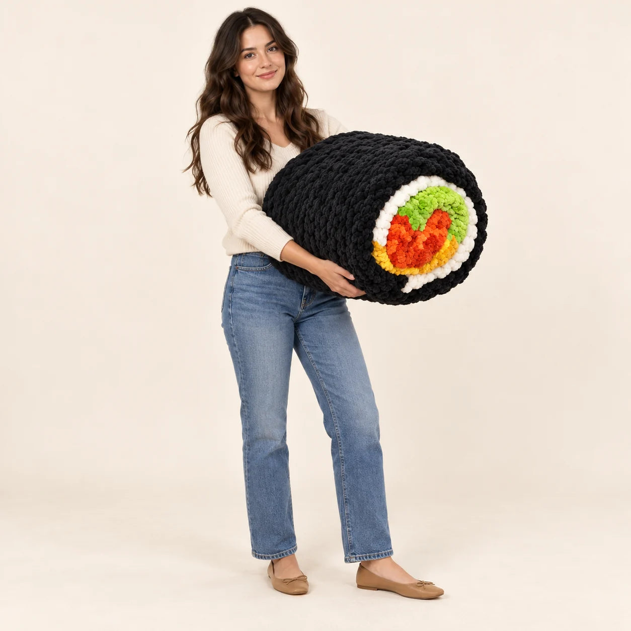 Model holding the rolled Sushi Blanket